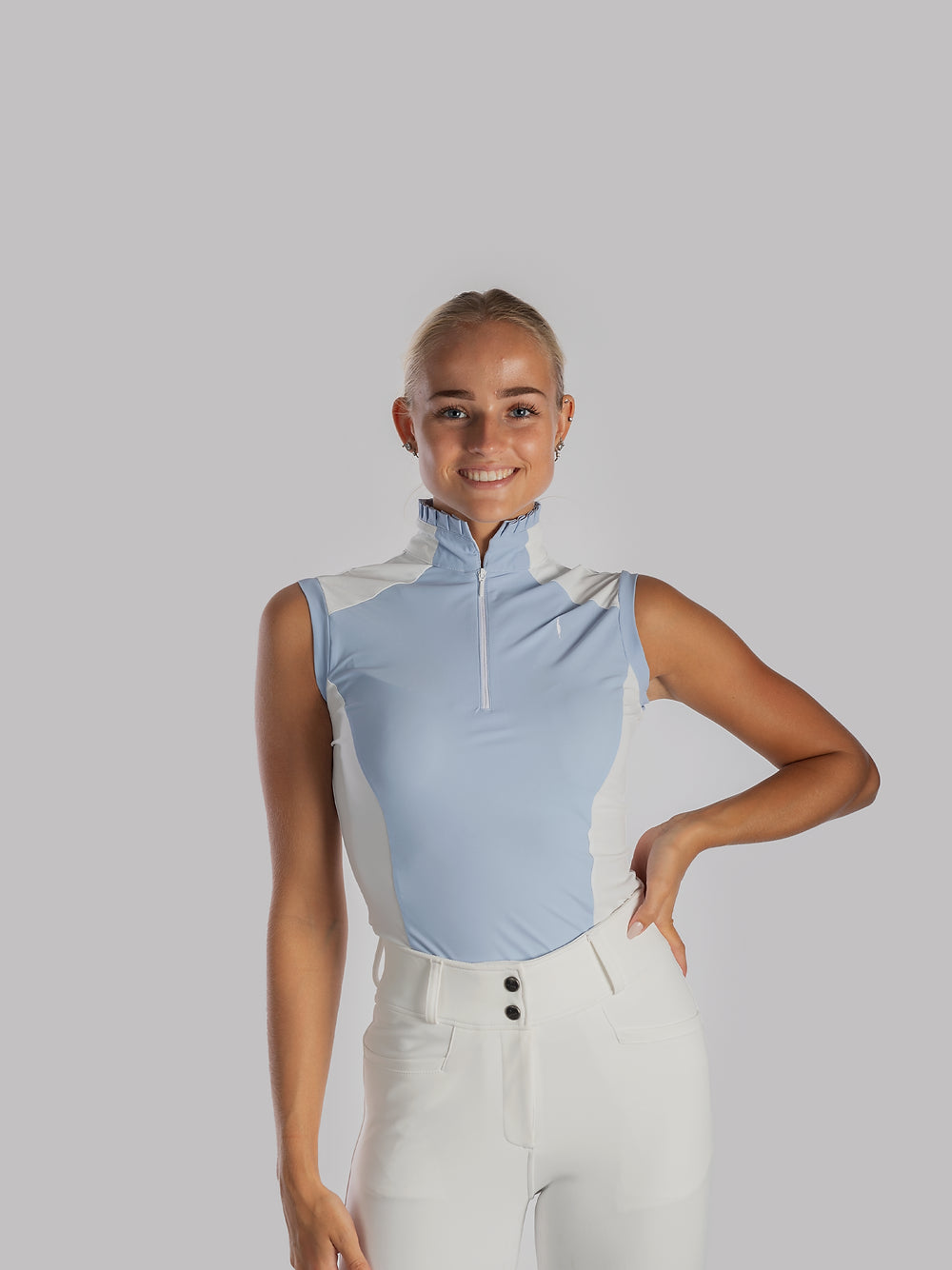 Aviar Sleeveless Zip-up Ruffle Shirt in Baby Blue with White Details